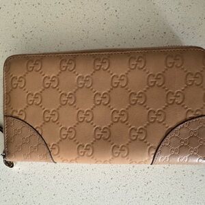 Gucci Beige Embossed Leather Wallet